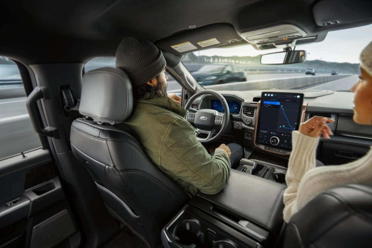 Man Woman Inside Ford Car Touchscreen