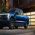 Blue Ford F-150 Lightning Pickup Truck Garage EV Charger