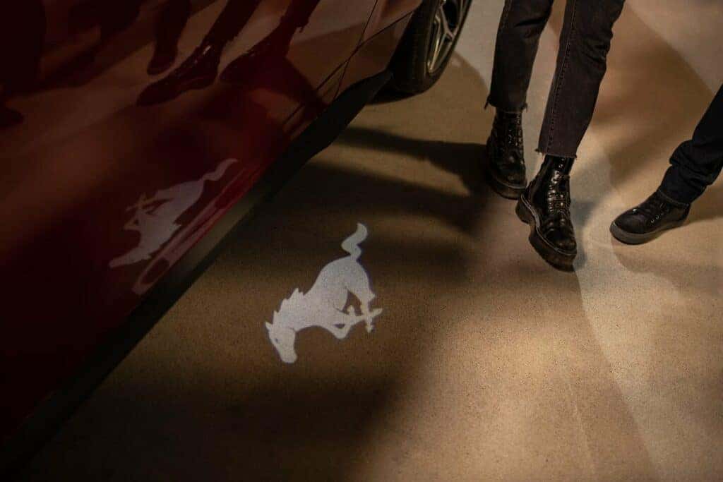 Red Car Door Ford Mustang Logo Three Black Shoes