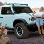 Woman Blue Ford Bronco Heritage SUV Mountains Chairs Rocks