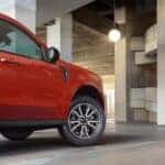 Red Ford Maverick Compact Pickup Truck Garage
