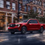 2026 Ford Maverick in red, in city streets