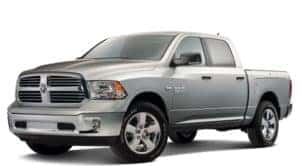 Silver 2018 RAM 1500 compared against the F-150