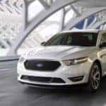 White 2018 Ford Taurus in bridge