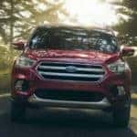 A red 2019 Ford EcoSport on a lease test drive from a local Ford dealer