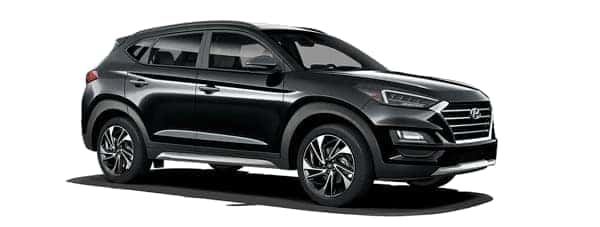 A black 2019 Hyundai Tucson is facing right.