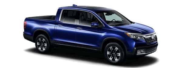 A blue 2019 Honda Ridgeline is facing right.