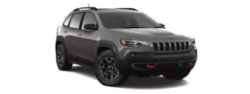 A grey 2019 Jeep Cherokee Trailhawk is angled right.