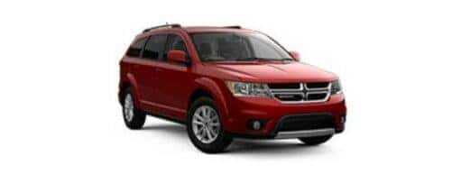 A red 2018 Dodge Journey is angled right.