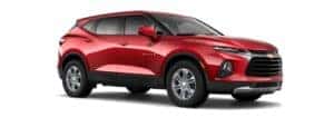 A red 2019 Chevy Blazer is facing right.
