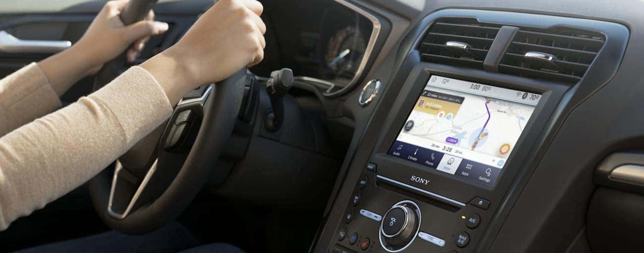 The interior technology features are shown inside a 2020 Ford Fusion.