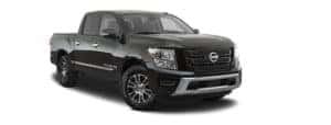 A black 2020 Nissan Titan is facing right.