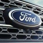 A close up of the Ford logo is shown.