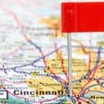 A map of Cincinnati, OH, is shown with a red flag marking it.
