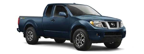 A blue 2020 Nissan Frontier is facing right.