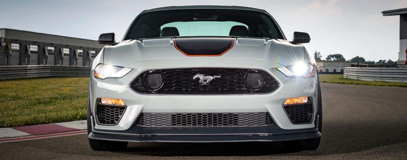 The grille of a white 2021 Ford Mustang Mach 1 is shown from the front.