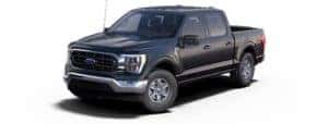 A black 2021 Ford F-150 is angled left.