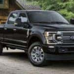 A black 2022 Ford F-250 Super Duty is shown from the side after leaving a Ford dealer in Cincinnati.
