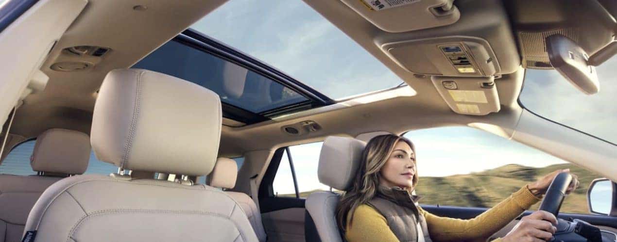 A person is shown driving a 2022 Ford Explorer.