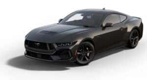 A black 2024 Ford Mustang GT is angled left.