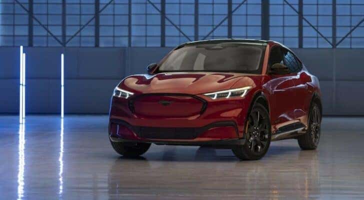A red 2023 Ford Mustang Mach-E is shown after viewing electric cars for sale.