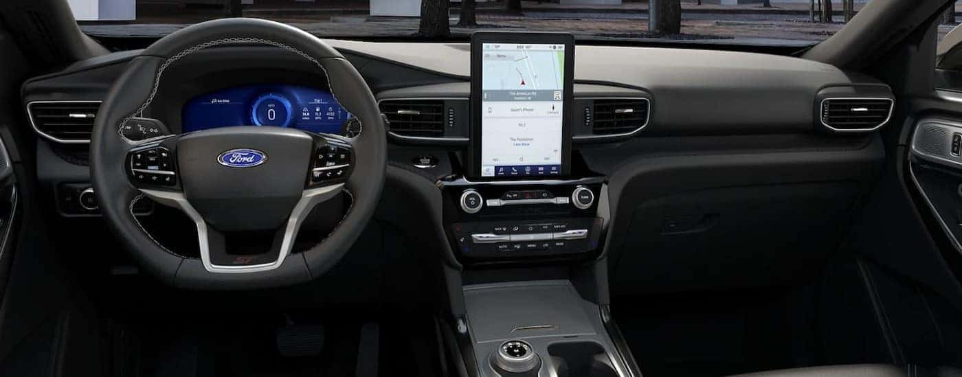The black dash in a 2024 Ford Explorer for sale is shown.
