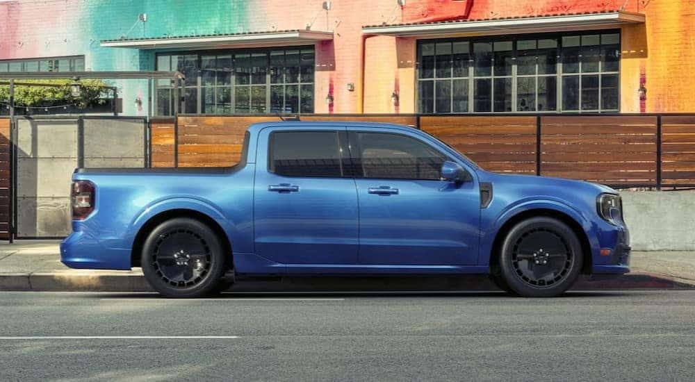 A blue 2025 Ford Maverick is shown parked near Cincinnati Ford dealers.