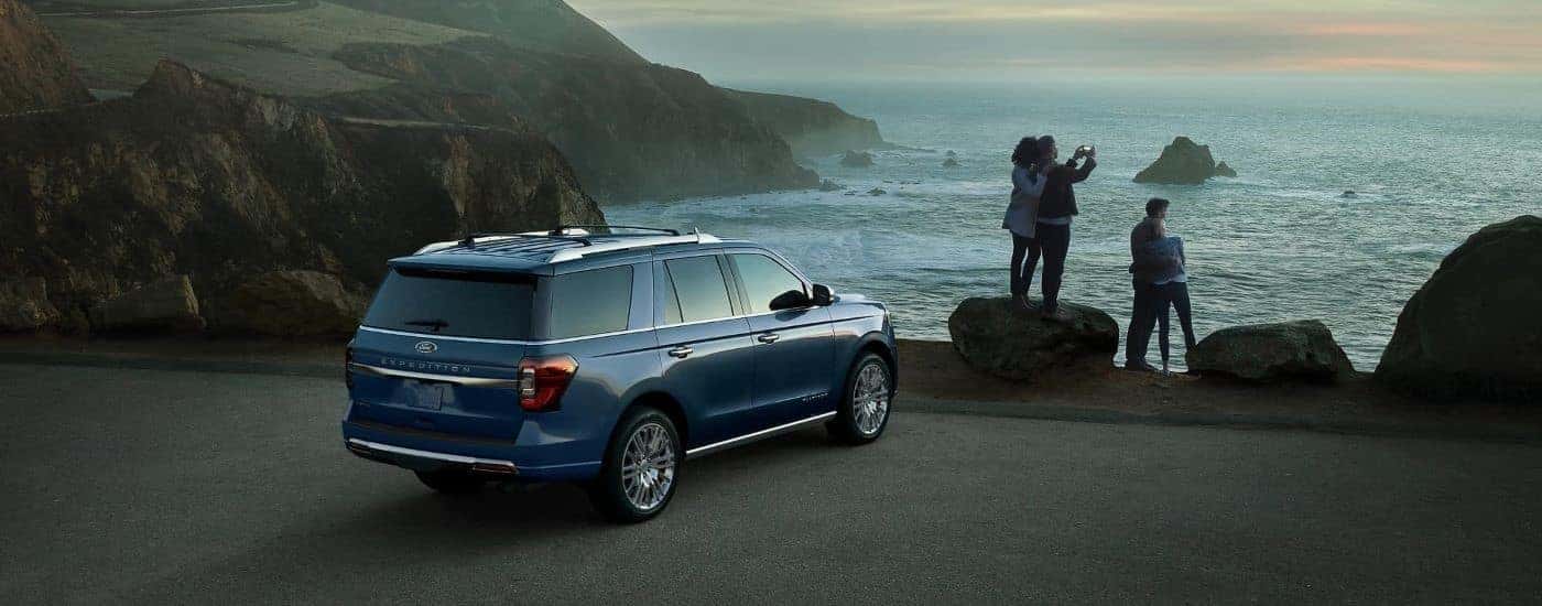 Rear angle view of a blue 2024 Ford Expedition for sale.