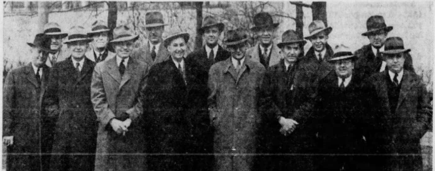 George F. Howard is shown in a group photo.