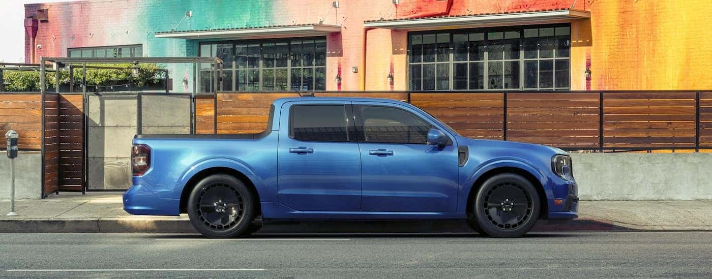 A blue 2025 Ford Maverick is shown parked after visiting a Ford dealer near West Chester.