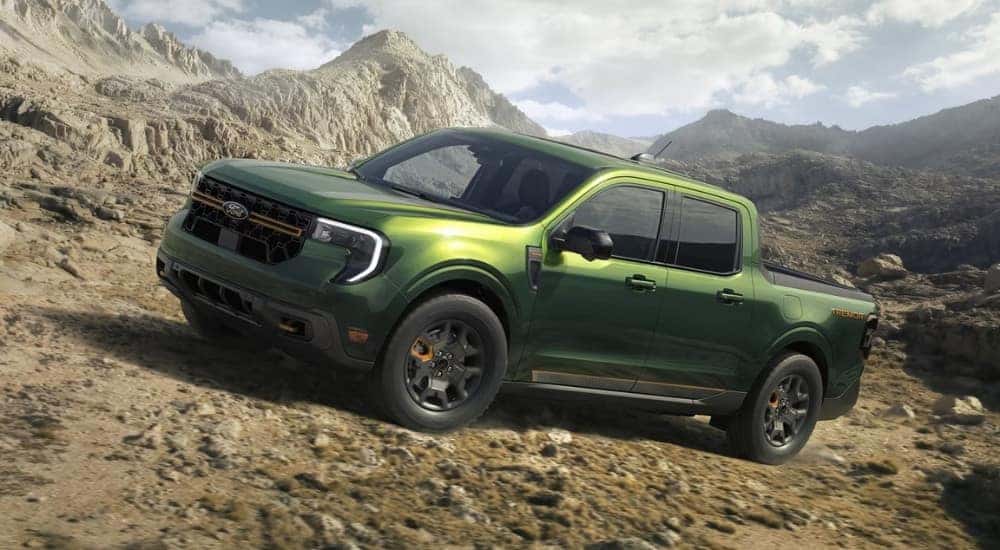 A green 2025 Ford Maverick Tremor is shown off-road.