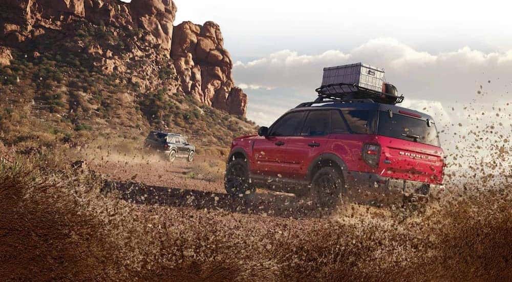 A red 2025 Ford Bronco Sport Badlands is shown racing off-road.