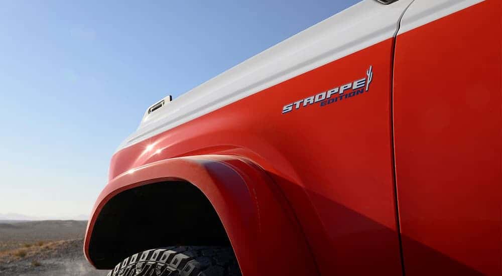Close-up on the badge of a white and orange 2025 Ford Bronco Stroppe Edition.