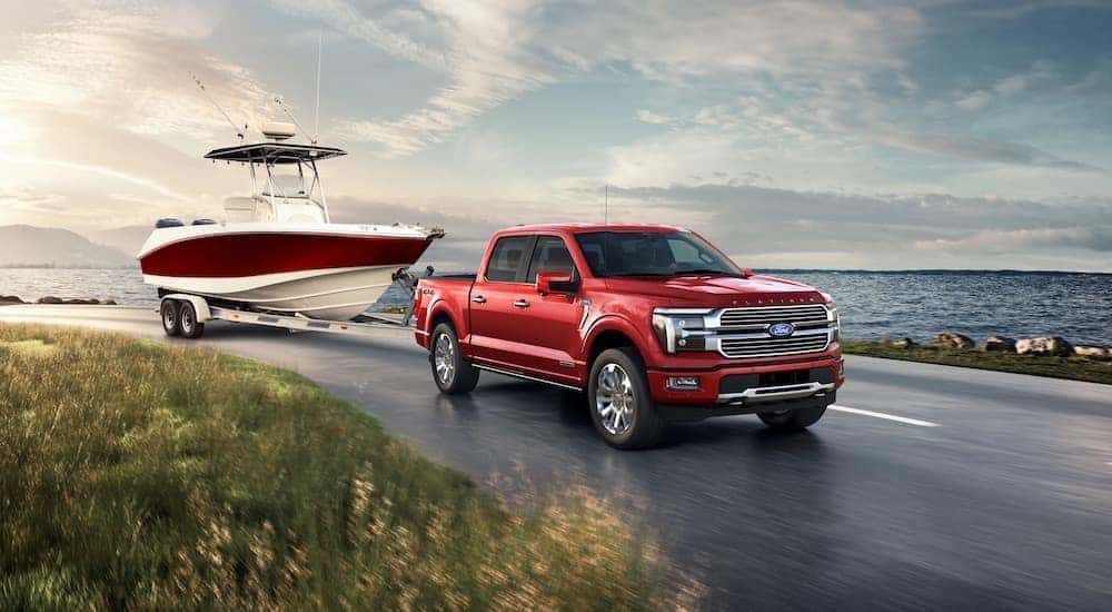 A red 2025 Ford F-150 for sale near Loveland is shown from the front at an angle.