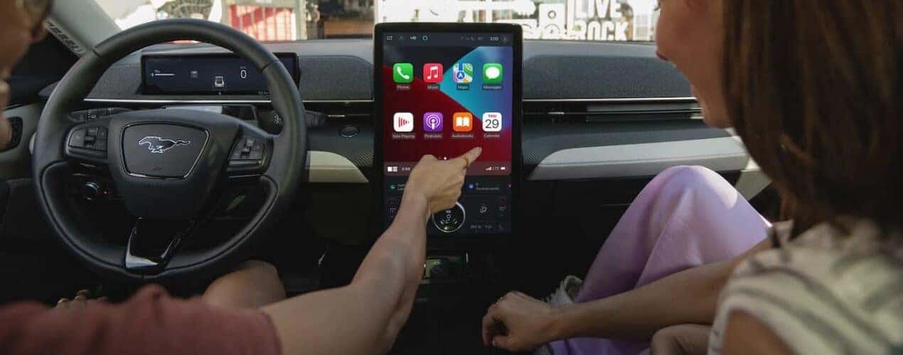 A close-up of the black dash is shown in a 2025 Ford Mustang Mach-E.