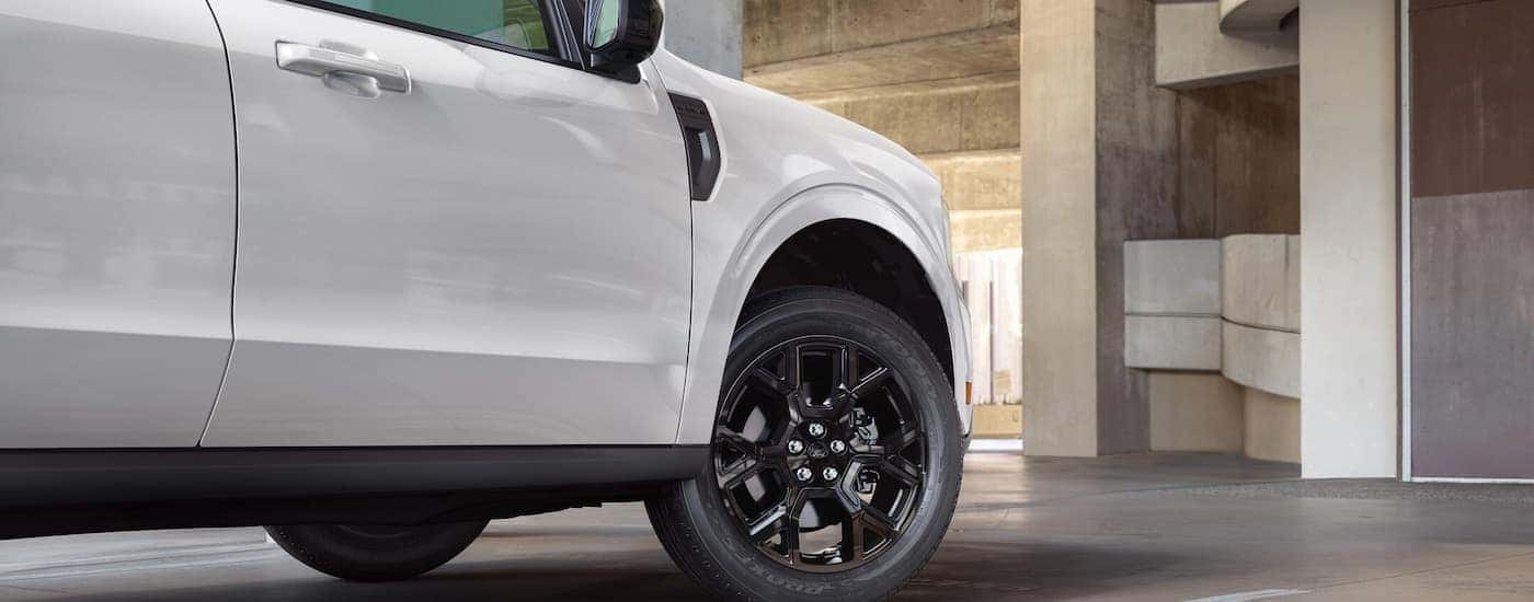 A close up of the wheel on a white 2025 Ford Maverick.