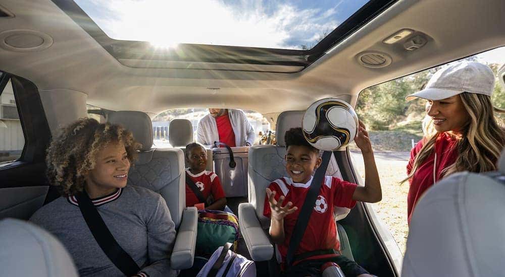 Kids with soccer gear in the back of a 2025 Ford Explorer.