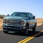 A teal 2025 Ford F-350 form the front.