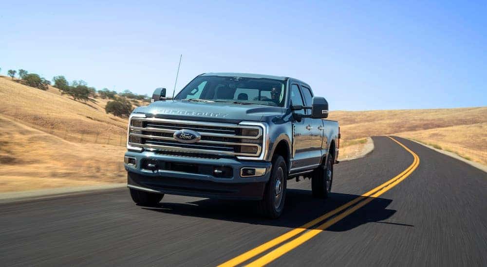 A teal 2025 Ford F-350 form the front.