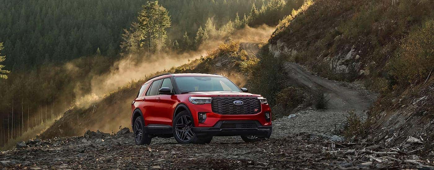 A red 2025 Ford Explorer parked off-road