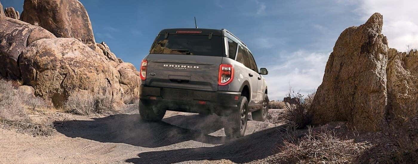 A gray 2024 Ford Bronco Sport off-roading on a trail