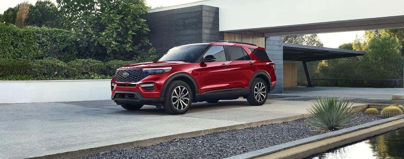 A red 2024 Ford Explorer for sale near Springfield parked on a driveway.
