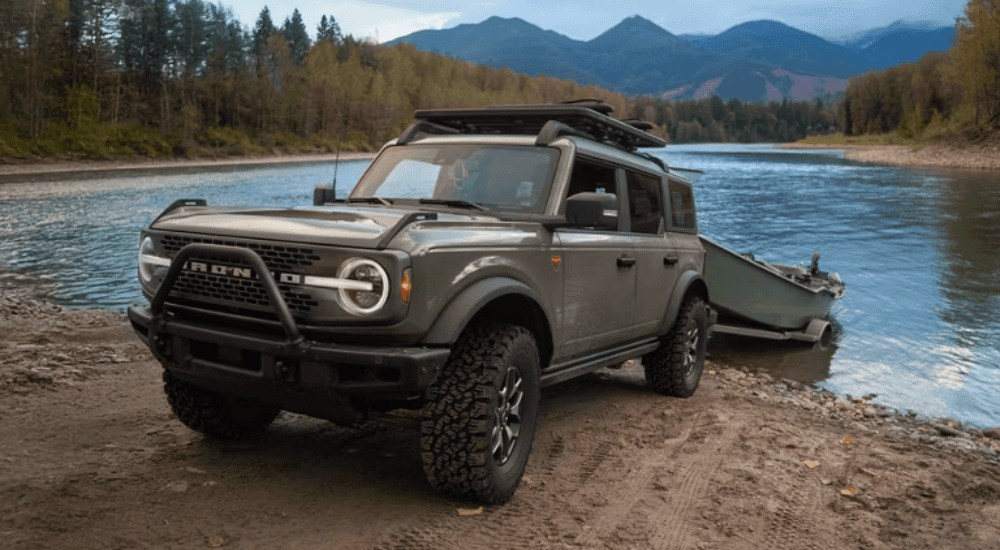 Green 2026 Ford Bronco pulling a boat out of water