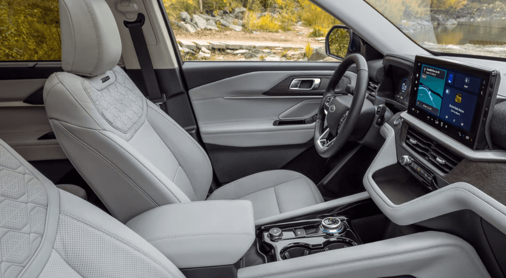 White leather stitched interior of the 2026 Ford Explorer Platinum.
