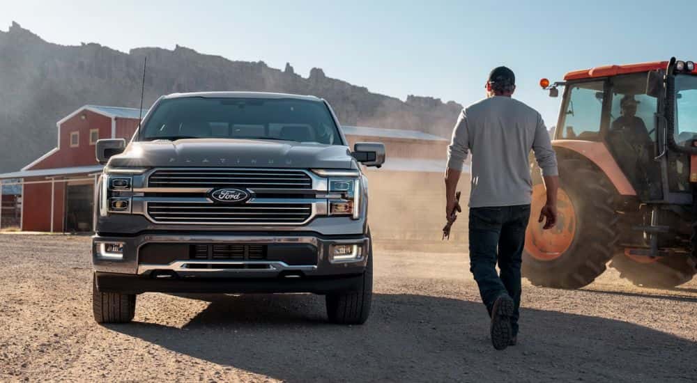 Grey 2026 Ford F-150 Platinum on a farm