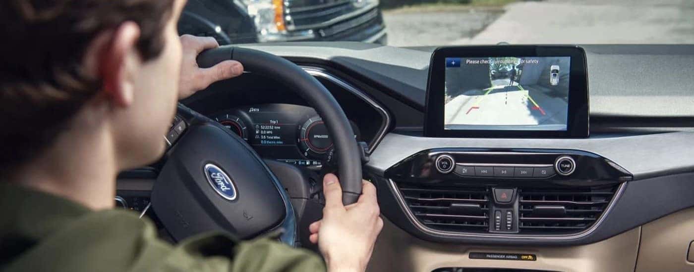 Interior view of someone driving a 2022 Ford Escape.