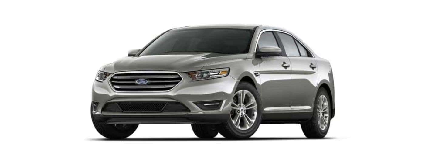 2018 Silver Ford Taurus angled left.