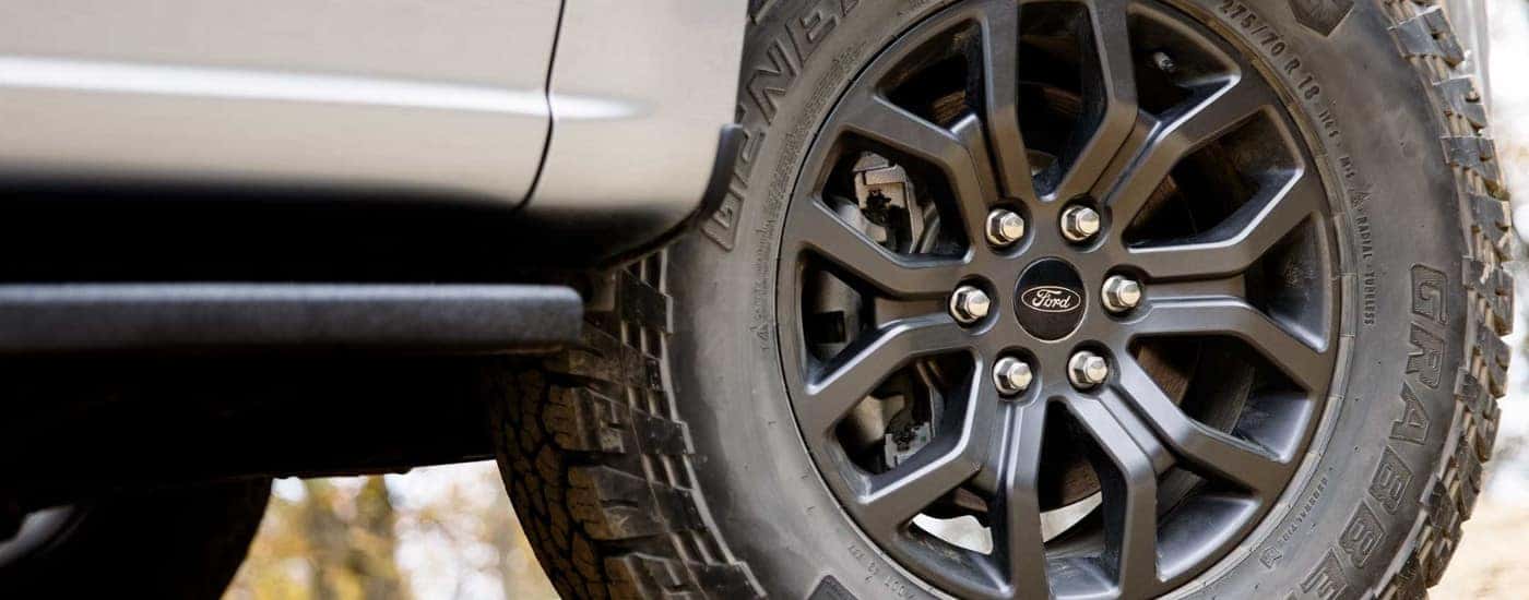 Wheel and tire on a silver 2024 Ford F-150 Tremor.