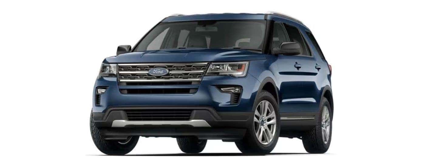 A blue 2019 Ford Explorer angled left on a white background.