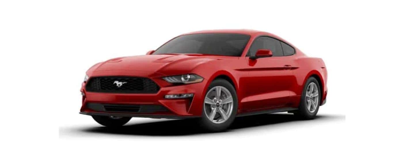 A red 2020 Ford Mustang parked at a left angle with a white background. 